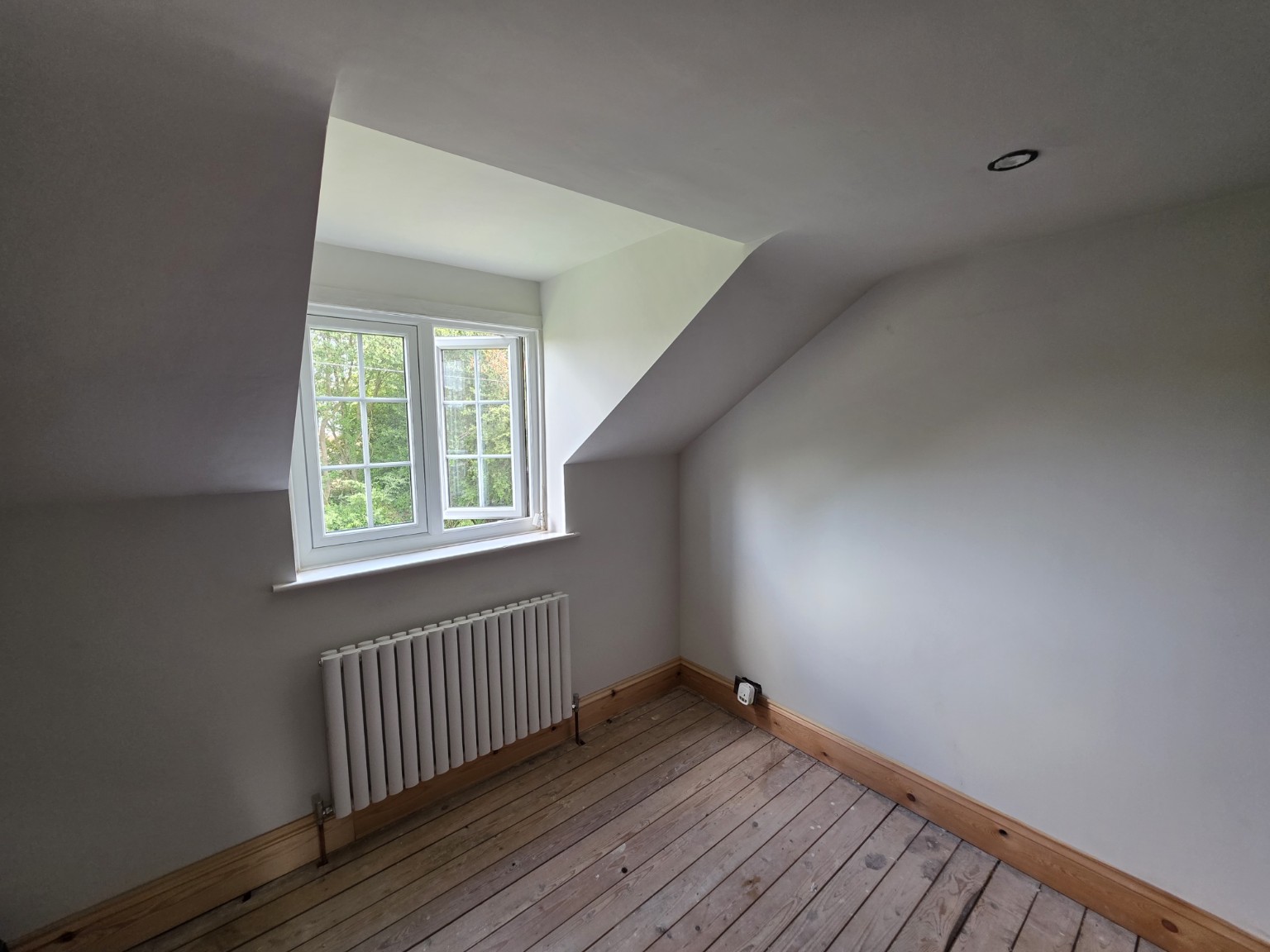 Plastered bedroom with clean lines